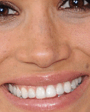 Meghan eyes to sides of lips